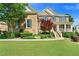 Stunning home featuring a well-kept lawn, brick facade, and inviting front entrance at 3456 Glen Mist Pl, Dacula, GA 30019