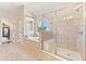 Spacious main bathroom features glass enclosed shower and a separate soaking tub at 3456 Glen Mist Pl, Dacula, GA 30019