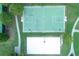 Overhead view of basketball and sand volleyball court in a well-maintained sports area at 3456 Glen Mist Pl, Dacula, GA 30019