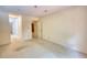 Empty bedroom with carpeted floors, yellow walls, and neutral trim at 107 Ridley Howard Ct, Decatur, GA 30030