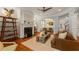 Inviting living room featuring a fireplace, hardwood floors, and stylish decor at 1560 Gilstrap Nw Ln, Atlanta, GA 30318
