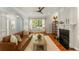 Cozy living room with a fireplace, hardwood floors, and stylish furniture at 1560 Gilstrap Nw Ln, Atlanta, GA 30318
