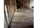 Unfinished basement with exposed framing, subfloor, and access to upper level at 2079 Bencal Se Dr, Atlanta, GA 30316