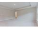 Spacious bedroom with a tray ceiling and plush carpet at 2089 Lanier Harbor Pt # 2089, Buford, GA 30518