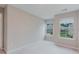 Bright bedroom with neighborhood views from two windows at 2089 Lanier Harbor Pt # 2089, Buford, GA 30518
