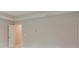 Large bedroom featuring tray ceiling and neutral wall color at 2089 Lanier Harbor Pt # 2089, Buford, GA 30518