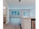 Well-appointed kitchen view with modern island that faces a bright living room at 2089 Lanier Harbor Pt # 2089, Buford, GA 30518