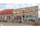 Commercial storefronts with outdoor seating in front of historic brick and stone buildings at 2364 Haran Dr # 35, Lithonia, GA 30058