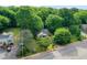 An aerial perspective captures the house with mature trees and convenient proximity to a nearby street at 338 Candler Rd, Atlanta, GA 30317