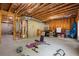 Spacious unfinished basement featuring an open layout with exposed beams and concrete walls at 1810 Annie Nw St, Atlanta, GA 30318