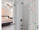 Bathroom with a shower and bathtub with a polka dot shower curtain and bedroom view at 1810 Annie Nw St, Atlanta, GA 30318