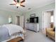 View of a light and airy bedroom, with doors leading to other rooms at 1810 Annie Nw St, Atlanta, GA 30318