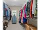 Walk-in closet with ample storage, shelving and a window for natural light at 1810 Annie Nw St, Atlanta, GA 30318