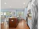 Open kitchen with a center island, stainless steel appliances, and a breakfast nook at 1810 Annie Nw St, Atlanta, GA 30318