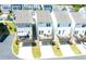 Aerial view of a community featuring backyard decks and convenient rear parking in a townhome setting at 458 Bishop Ln, Woodstock, GA 30188