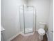 Bathroom featuring modern vanity, toilet, and a bright glass shower at 458 Bishop Ln, Woodstock, GA 30188