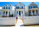 Charming two-story home with white picket fence and inviting front porch, perfect curb appeal at 458 Bishop Ln, Woodstock, GA 30188