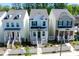 Charming two-story home with inviting front porch, landscaped yard, and black shutters at 458 Bishop Ln, Woodstock, GA 30188