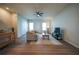 Comfortable living room features hardwood floors, neutral decor and a view of the entryway at 458 Bishop Ln, Woodstock, GA 30188