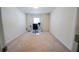 This bright, carpeted office features neutral walls, a window with blinds, and a desk and chair at 458 Bishop Ln, Woodstock, GA 30188