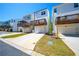 Modern townhomes with garage parking and wooden decks at 458 Bishop Ln, Woodstock, GA 30188