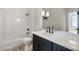Modern bathroom featuring subway tile, black fixtures, and patterned floor at 609 Pinetree Dr, Decatur, GA 30030