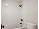 Clean bathroom with white subway tile, modern fixtures, and a shower and tub combination at 609 Pinetree Dr, Decatur, GA 30030