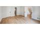 Open bedroom with hardwood floors and views to other rooms, bright space at 609 Pinetree Dr, Decatur, GA 30030