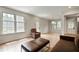Bright living room featuring hardwood floors, comfortable seating, and a doorway leading to the kitchen at 609 Pinetree Dr, Decatur, GA 30030