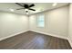 Bedroom showcasing natural light and updated flooring at 6205 Hudson Nw St, Covington, GA 30014