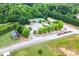 Aerial view showcasing a community pool and pavilion with a parking lot at 2086 Grant Ave, Mcdonough, GA 30252