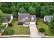 Lovely home with an expansive, well-manicured lawn and mature trees at 2086 Grant Ave, Mcdonough, GA 30252