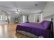 Spacious bedroom featuring hardwood floors, ample natural light, and neutral wall color at 2086 Grant Ave, Mcdonough, GA 30252
