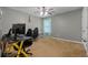 Bedroom with Lazzo gaming desk, neutral walls and carpet at 2086 Grant Ave, Mcdonough, GA 30252
