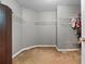 Spacious walk-in closet provides ample storage with wire shelving and a carpeted floor at 2086 Grant Ave, Mcdonough, GA 30252