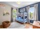 bedroom with hardwood floors, a bunk bed and plenty of natural light at 437 E Ontario Sw Ave, Atlanta, GA 30310