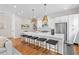 Bright, open kitchen with island seating and stainless steel appliances at 437 E Ontario Sw Ave, Atlanta, GA 30310