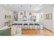 Modern kitchen featuring a large island with seating and stainless steel appliances at 437 E Ontario Sw Ave, Atlanta, GA 30310