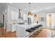 Spacious kitchen featuring a large island with barstool seating and modern finishes at 437 E Ontario Sw Ave, Atlanta, GA 30310