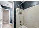 This bathroom features a shower with a shower head and a view into another room at 4769 Ellington Ct, Marietta, GA 30067