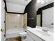 This bathroom features a white sink and toilet with a tub and shower combination at 4769 Ellington Ct, Marietta, GA 30067