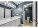The bathroom features a granite sink with a view into another bathroom at 4769 Ellington Ct, Marietta, GA 30067