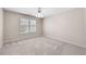 This bedroom has a large window and carpet at 4769 Ellington Ct, Marietta, GA 30067