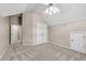 This is a bedroom with carpet and multiple doors, with a large ceiling fan at 4769 Ellington Ct, Marietta, GA 30067