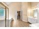 Bright main bathroom features a walk-in shower, soaking tub, and dual sink vanity at 4769 Ellington Ct, Marietta, GA 30067