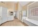 A spacious main bathroom with separate shower and tub and tiled floors at 4769 Ellington Ct, Marietta, GA 30067