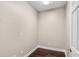 Small and cozy office with hardwood floors, neutral walls, white trim, and an electrical outlet at 4769 Ellington Ct, Marietta, GA 30067