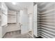 Large walk-in closet with built-in shelving at 4769 Ellington Ct, Marietta, GA 30067