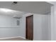 Spacious basement featuring neutral paint, laminate floors, and ample lighting at 5295 Old Trail Cir, Stone Mountain, GA 30088