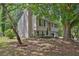 Home exterior with mature trees at 5295 Old Trail Cir, Stone Mountain, GA 30088